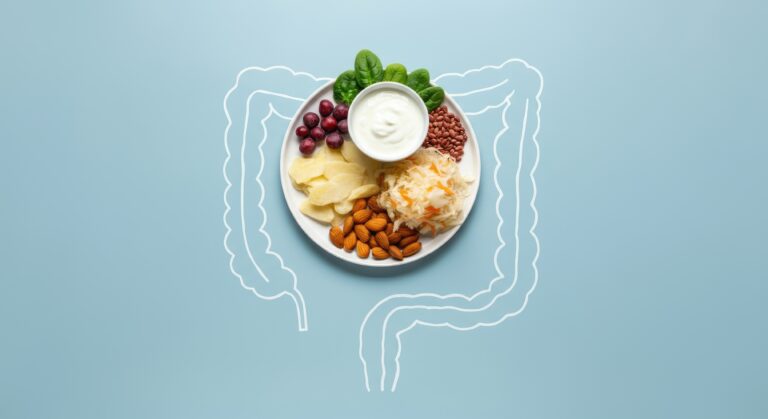 Healthy foods on plate within large intestine outline, promoting gut health